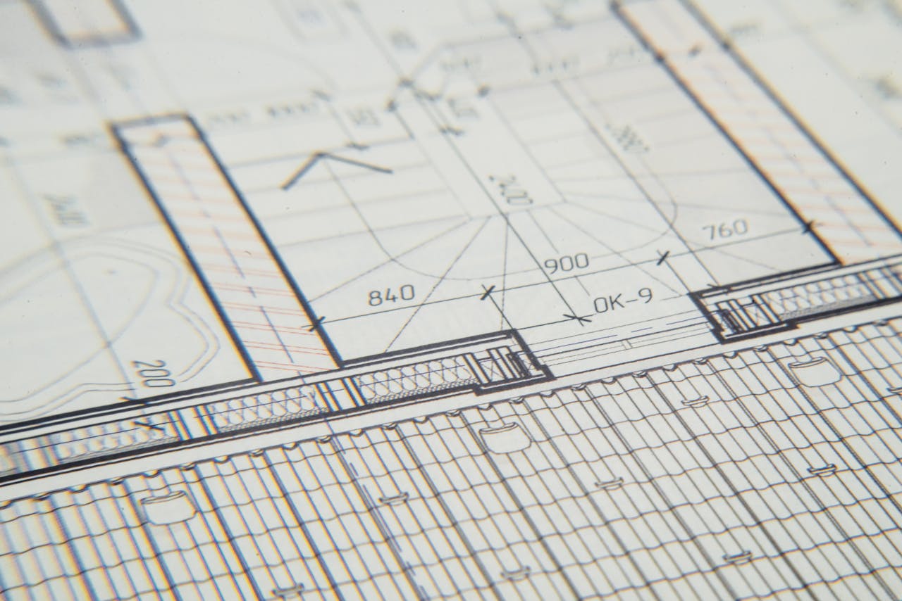 Close-up of an architectural blueprint showcasing intricate design details for a building layout.